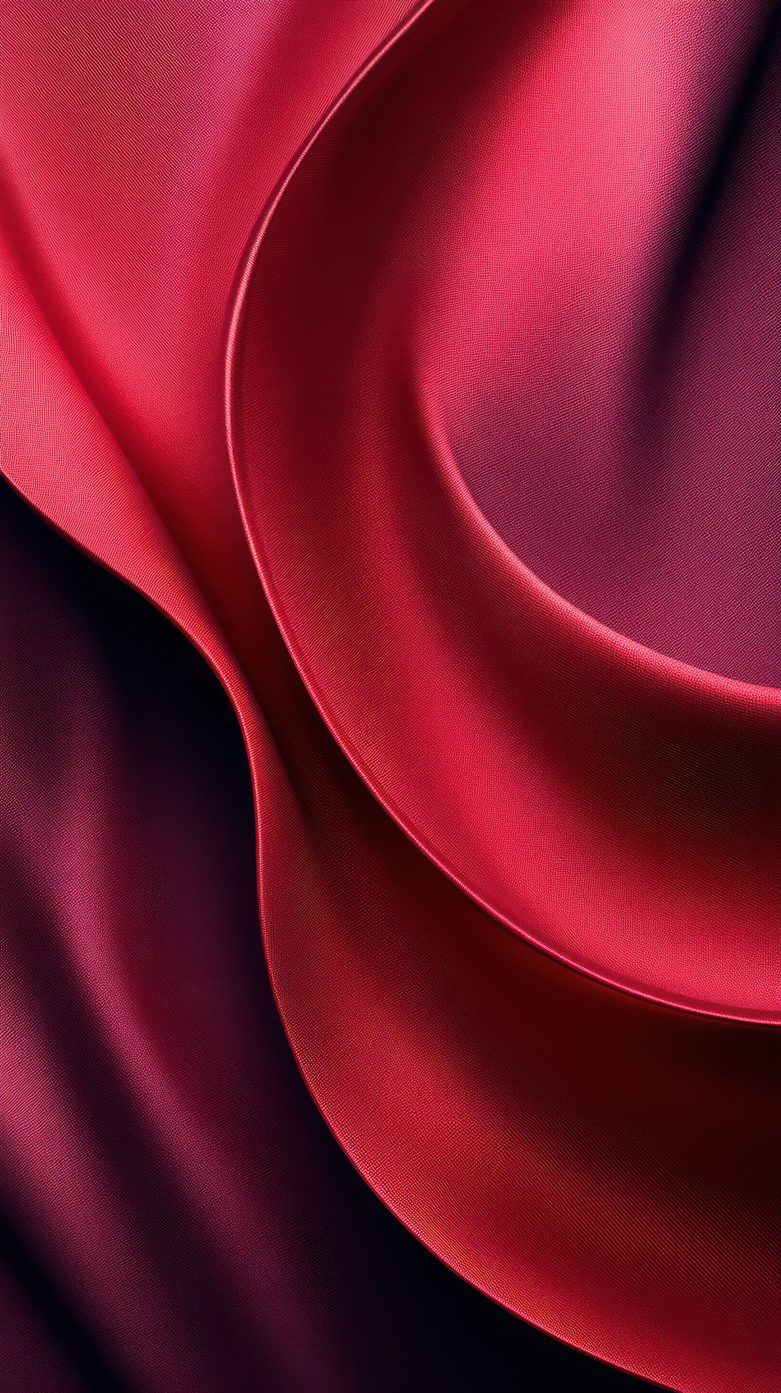 Red satin fabric flowing elegantly in soft curves and gentle folds under warm light
